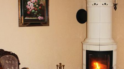 Ein Kaminofen der Ofenbaukünstler HARK sorgt im Wohnbereich für ein einmaliges Feuererlebnis.