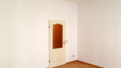 mehrgeschossiges Wohngeb&auml;ude mit Dachgeschoss.