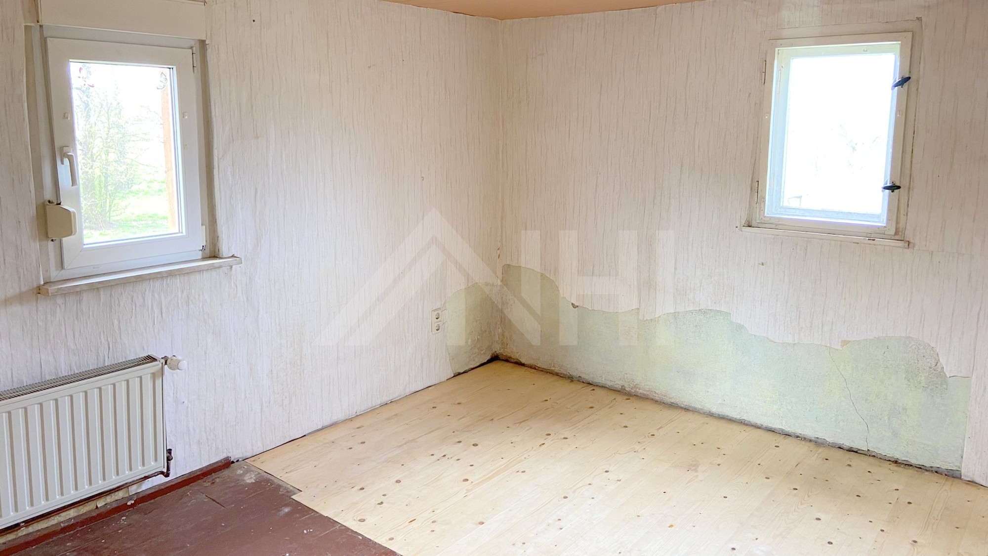 22_nachhause-immobilien_68ed096e-01df-41ab-bccc-e07f0a443473_bild Optimal f&uuml;r eine junge Familie, die das Wohnen im Gr&uuml;nen sch&auml;tzt ... Kleines Einfamilienhaus auf gro&szlig;em Grundst&uuml;ck